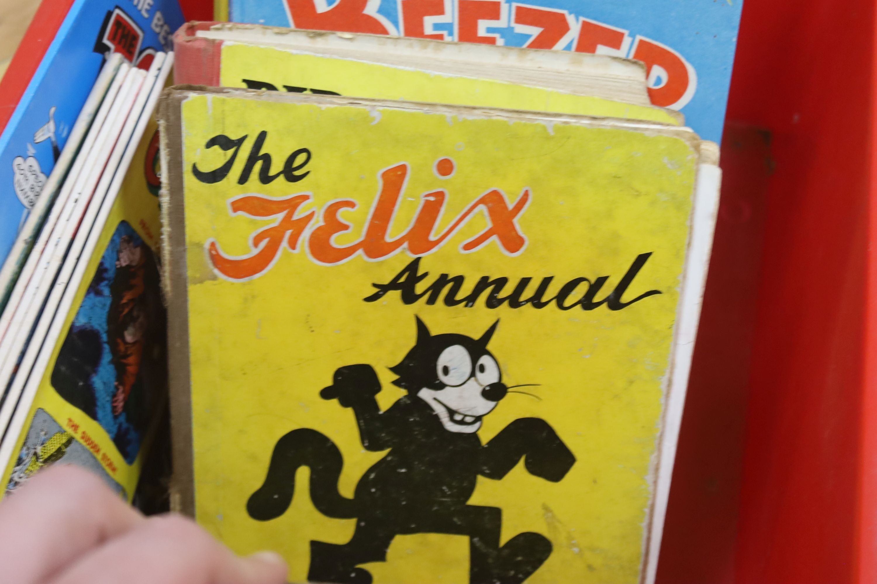 A collection of children's books including the Felix annual, PIp and squeak annual 1929 and 1923, Wilfrid‘s annual 1930 and 1933, Down at the Farm with Enid Blyton, Sunny Stories annual, the lovesome book for little folk